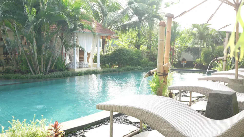 Accommodation: the pool and garden at the retreat center